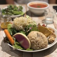 Salad with “honey”mustard dressing, brown rice, bean dip with nachos, karaage and tomato side dish  at AIN SOPH.Journey in Tokyo