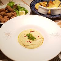 Humus, fried potatoes and karaage at AIN SOPH.Journey in Tokyo