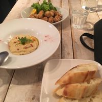 Hummus and bread and then crispy chicken in the back at AIN SOPH.Journey in Tokyo