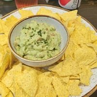 Guacamole and tortilla chips 😍 at Kaju in Coimbra