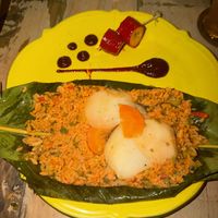 ARROZ VEGANO
Vegan Cartagenian rice with carrots, eggplant, green and red pepppers, capers, olives and potatoes, sloowly cooked in plantain leaves  at Restaurante Candé in Cartagena