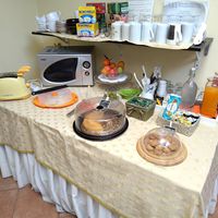 Breakfast corner with vegan cake and cookies at La Gemma in Naples