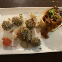 Seitan, vegetables and olives in puff pastry with mushroom and potato gnocchi    at Bar Recyclart in Brussels