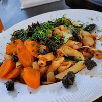 Penne with sun-dried tomato pesto, grilled vegetables and black olives. at Bar Recyclart in Brussels
