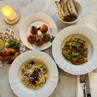 From left to right: croquettes, dauphine potatoes, orecchiette, roasted cauliflower    at Faubourg Daimant in Paris