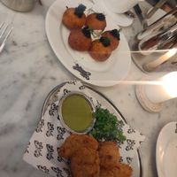 Pommes dauphine au "caviar", croquettes cochonnes at Faubourg Daimant in Paris