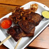 Anticuchos with rachi at Oiga in Lima