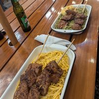 Anticucho con tallarines a la huancaína, y tallarines verdes at Oiga in Lima