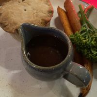 Mushroom pie with gravy and sides  at The Crown in Oxford