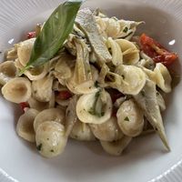 Orecchiette con pomodorini e carciofi  at Ristorante Il Boschetto in Follonica