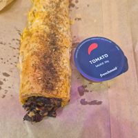 Eggplant, capsicum, rocket, semidried tomato roll $9.00: ok, heated up in microwave so not crispy.  at The Green Bakery in Sydney