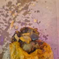 Eggplant, capsicum, rocket, semidried tomato roll $9.00: ok, heated up in microwave so not crispy.  at The Green Bakery in Sydney