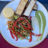 Grilled smoked tofu with green sauce and grilled vegetables at Arcobaleno in Medulin