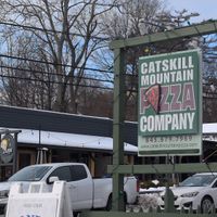 Exterior sign at Catskill Mountain Pizza Co in Woodstock