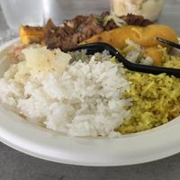 Basmati and jasmine rice and plantain canoas with vegan meat  at La Familia in Mayaguez