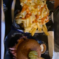 SPICE BOY burger
(with Fiery jalapeno slaw, crispy onion & sriracha mayo) and loaded fries with vegan mac+cheese at Scotch & Rye in Inverness