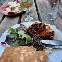 Salad (with wonderful dressing and lettuce fresh from the garden), rice topped with garden veggies, and a pocket-bread filled with vegan meat and cheese at Le Chateau de Cambiaire in Saint-etienne-vallee-francaise