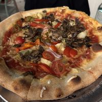 Veggie pizza but substitute vegan cheese   at Pigzza in Orlando
