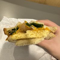 inside (Just Egg, cheese, onions, spinach)   at SEA - Costa Coffee - North Terminal in Seattle