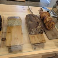 Lemon poppy cake, banana bread and cardamom knots at Tonka Pastisseria Vegana in Barcelona