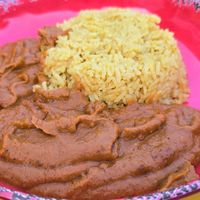 Nkatsi Froyi & Saffron Rice: "Creamy natural peanut butter cooked slowly with onions, ginger, garlic, tomatoes, and a blend of spices, creating a rich stew" at Asempe Kitchen in Ithaca