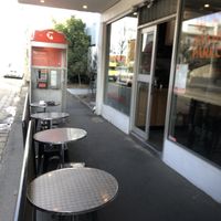 The front of the shop and outdoor seating. Seating inside as well.   at Rusty's Sandwich Parlour in Brunswick East