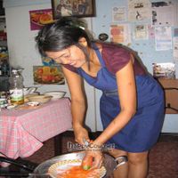 May Kaidee preparing a dish at May Kaidee's Vegetarian Restaurant - Samsen in Bangkok