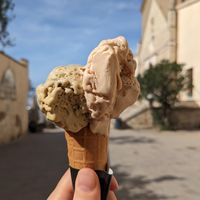 Vegan pistachio and hazelnut ice cream at Gelateria Le Logge in Orbetello