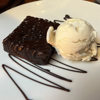 Vegan brownie with vegan ice cream and chocolate   at Hellfire in Dublin