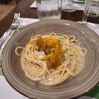 Spaghetti cacio e pepe, fiori di zucca croccanti e lime at La Puntarella Pazza in Rome