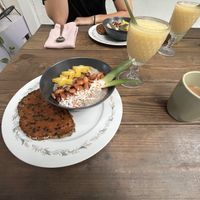 Guava jam / avocado oil toast; mango / soursop smoothie ; coconut chia pudding / star fruit, toast coconut and almonds, pineapple   at La Botanica Hotel in San Juan