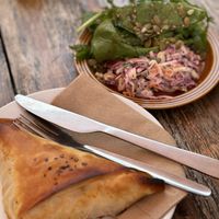 Vegan samosa and a side salad   at The Secret Garden Cafe in Cardiff