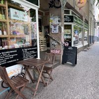 entry with outdoor seating at Dr. Pogo in Berlin