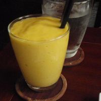 Delicious drinks include Mango Smoothies. at Hum Vegetarian - District 3 in Ho Chi Minh City