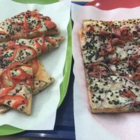 Jackfruit pizza and zucchini pizza at Primo Basilico in Lisbon