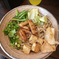 Noodle bowl with vegan chicken, tofu, cilantro, spring onions, sprouts, cabbage, beans, special (spicy) sauce and some crunchy whatever at Yaya's Thai Street Food in Augsburg