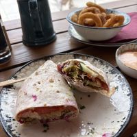 Falafel burrito and onion rings.  at King's Caffe Krk in Krk
