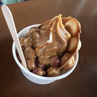 Waffle Cup with vegan frozen yoghurt, cherries and speculatius sauce   at YOMARO in Bonn