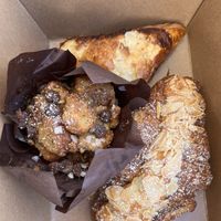 Peach turnover, peach crumble croissant, chocolate chip bread pudding  at Twelvemonth Bakehouse in Burlingame
