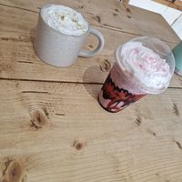 Hot pistachio and white chocolate latte and black cherry milkshake at The Pie Box Cafe in Cardiff