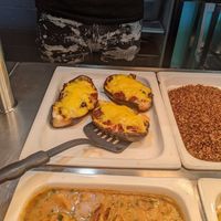 Filled aubergine with vegan cheese at Domek Smaków  in Mielno