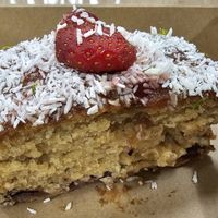 Strawberry, lime and coconut cake. at Caffè Isola  in Newport