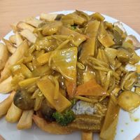 Mixed vegetable curry with rice and chips at De Bao in Skegness