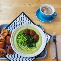 Super green vegan hummus, falafel, pita, coffee at Baba's Hummus House Bakery in Minneapolis