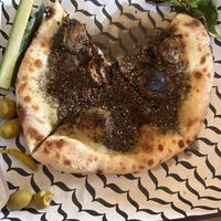 Za’atar mana’eesh (this is marked as vegan for online ordering but the labneh is not! Make sure to remove that)   at Baba's Hummus House Bakery in Minneapolis