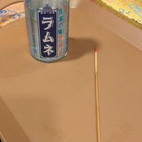 Winner Skewer with red tip! And the price drink I've chosen at OKO Takoyaki in Osaka