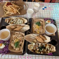 2 sets with both the takoyaki and kushikatsu skewers, comes with sides of rice, cabbage salad, and miso. Plus we got a side of fries. SO much food! at OKO Takoyaki in Osaka