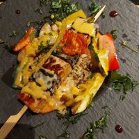 Tempehspieß auf Coucous und Reis mit Gemüse at Cool Run Inn in Innsbruck