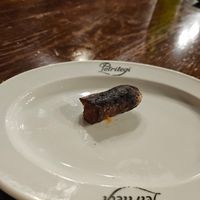 Looks burnt and unappealing, was delicious! at Petritegi Sagardotegia in Astigarraga