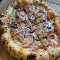 Photos don’t do it justice! Literally the tastiest dough ever  at Slicely Pizza in Keaau